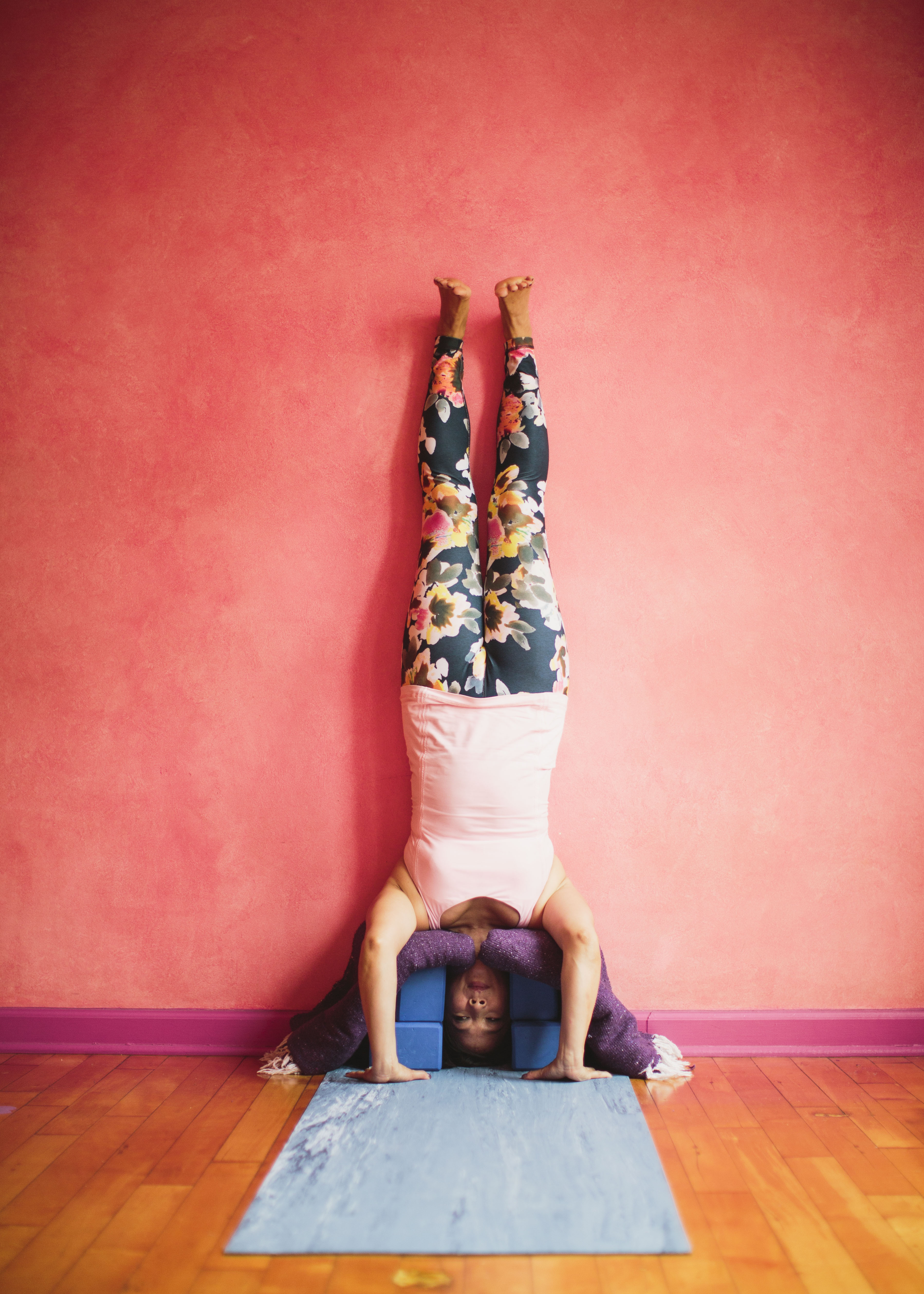 An Innovative Supported Headstand That Will Help You Overcome Your
